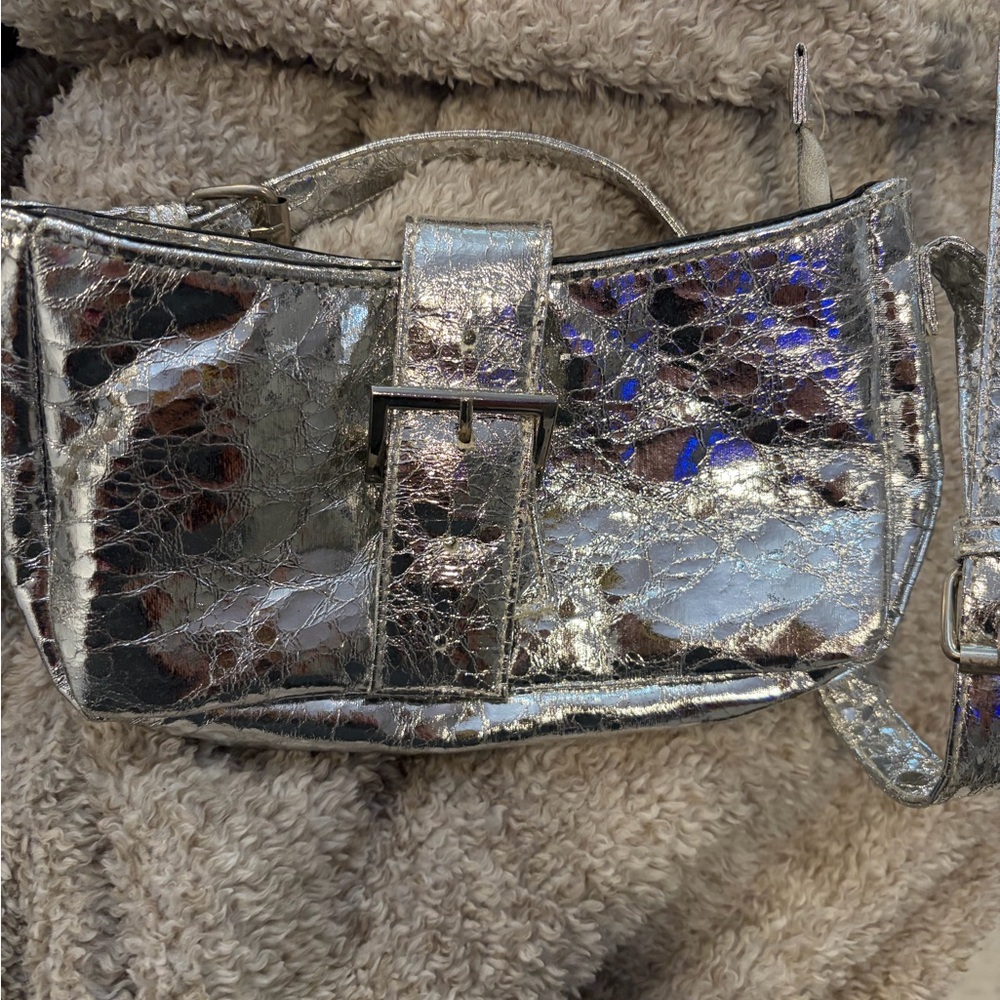 REVOLVE Shimmering Silver Clutch